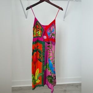 Beautiful Farm Rio silk dress with a tropical print .